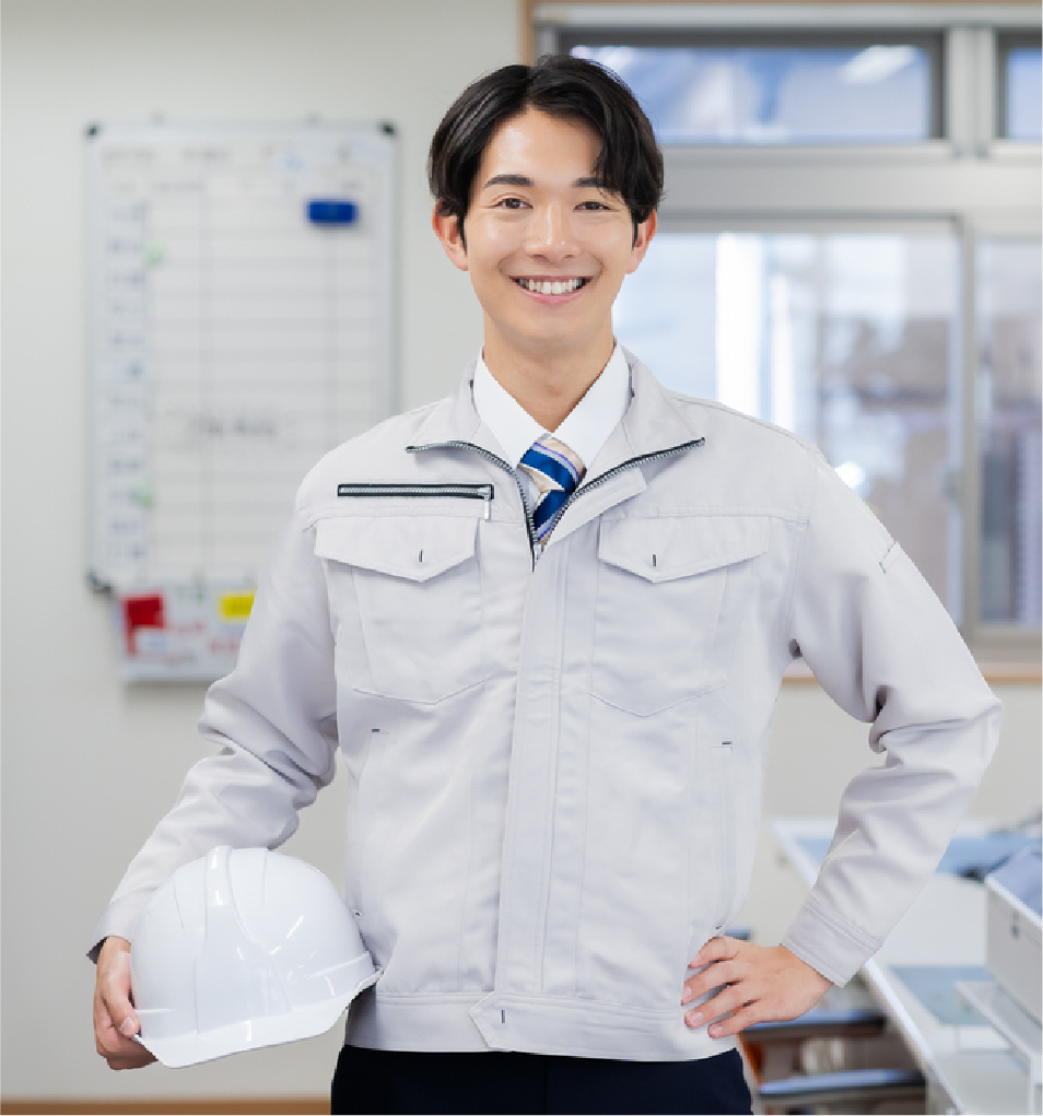 事務所でポーズを取るスタッフ